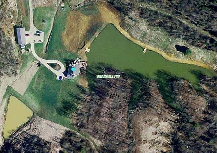 Lovely brick ranch on 191 acres