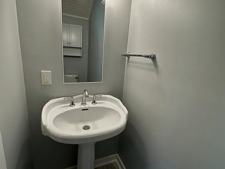 Half bathroom off second floor rear room - view 1