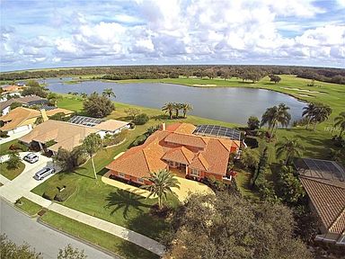 Enjoy panoramic water & golf course views from this John Cannon built home.