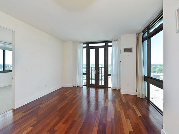 Living room with Juliette doors with great views!