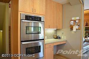Under-cabinet lighting at built in desk