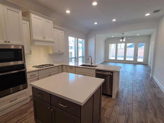 5th image of 8474 International Falls Dr