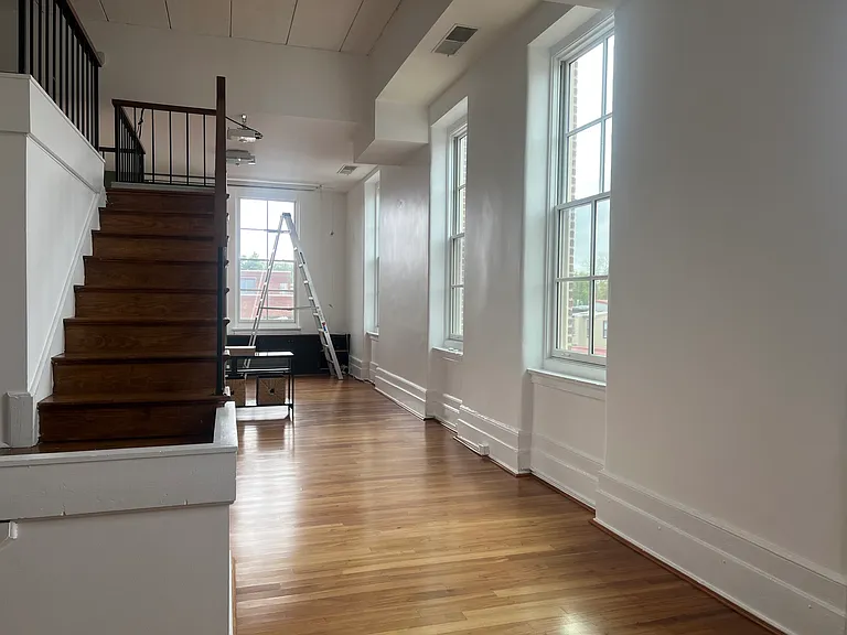 Recently replaced windows and replastered/repainted walls