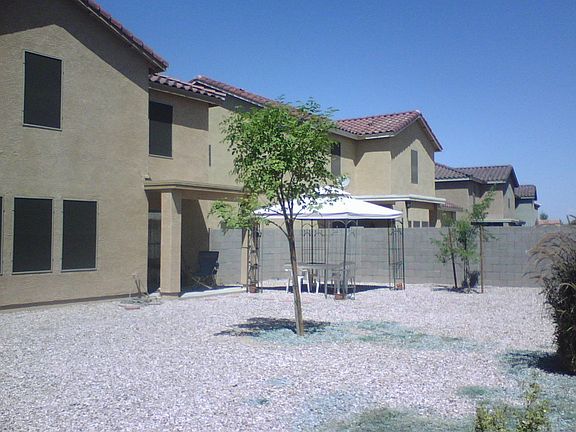 covered patio still lots of room for pool or kids playgym.