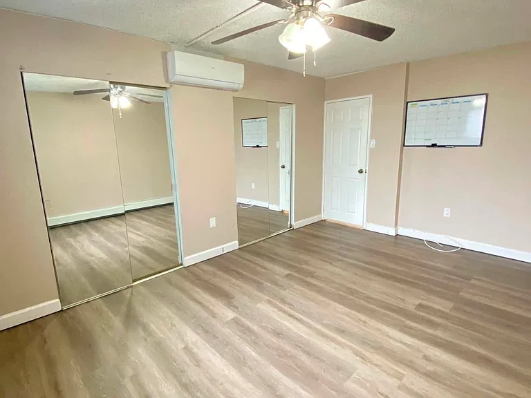 Bedroom with ample closet space