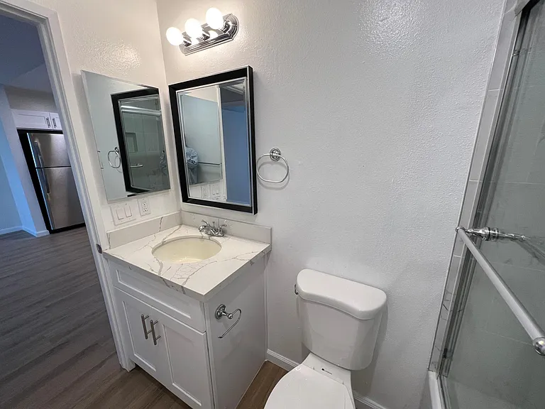 New light fixtures, sink and mirror!
