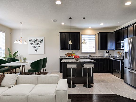 Model Representation - Abundant cabinet space in kitchen