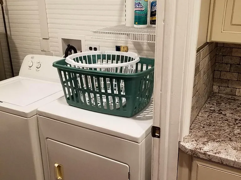 First floor laundry room accessible from kitchen