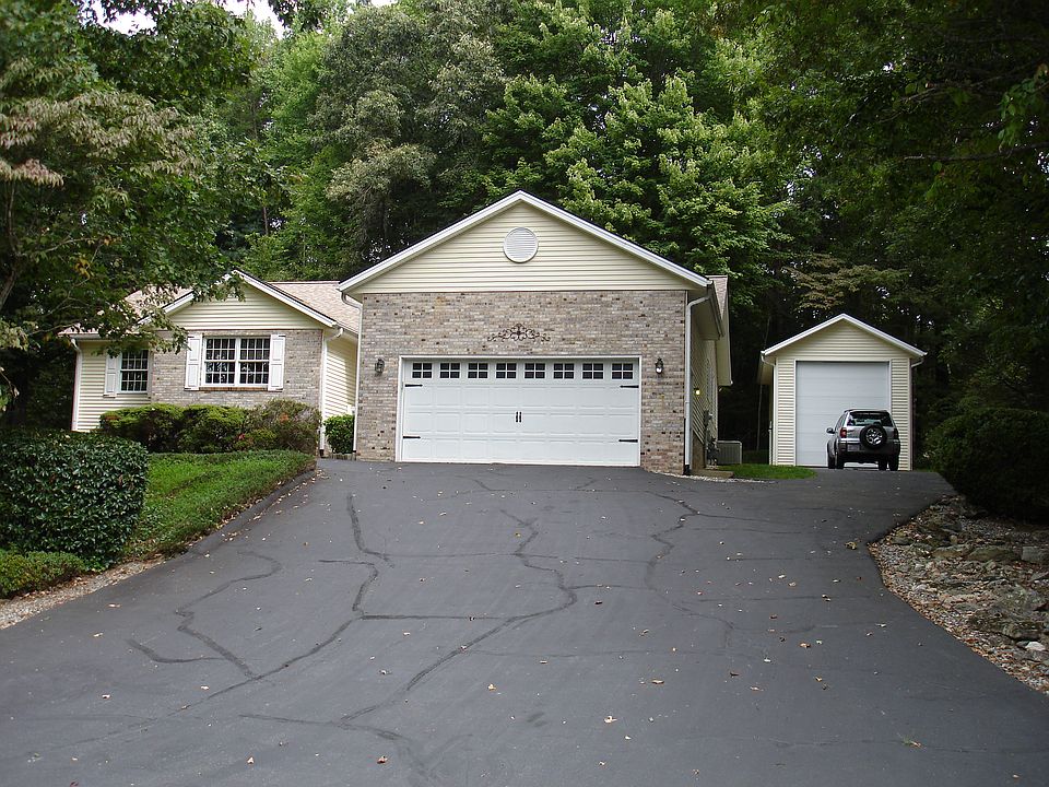 Front View Showing Large Garage.