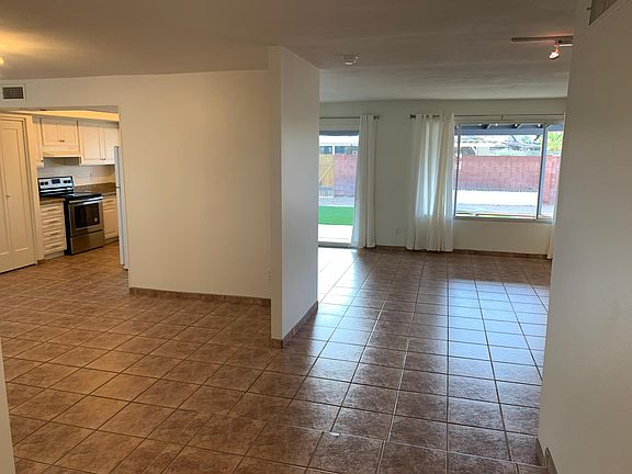 Front entry with kitchen, family room and living room