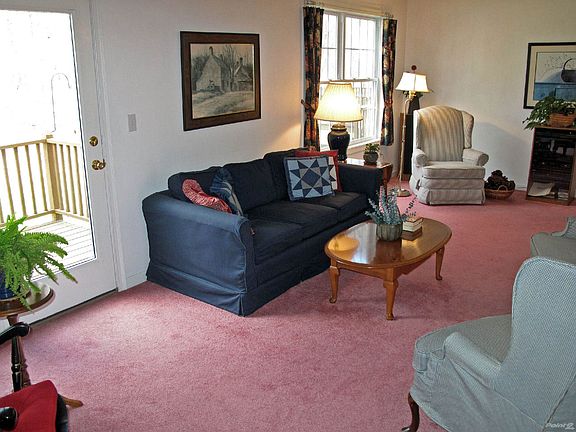 The 24' x 12' Living Room offers many options for conversation areas plus an atrium door to the deck.