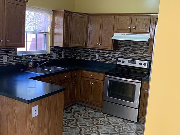 Kitchen with all appliances including stove, dishwasher & refrigerator