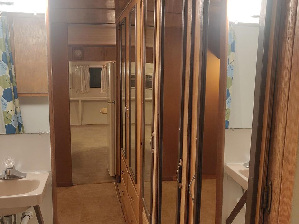 Hallway with storage toward kitchen