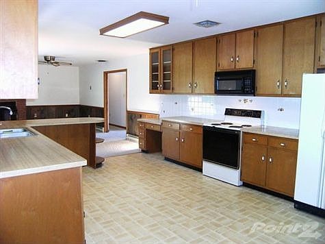 Enjoy An Open & Airy Kitchen....
