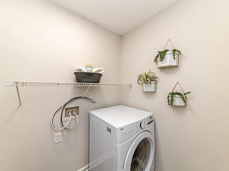 Laundry room with built in shelving