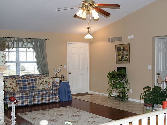 Entry features tile that extends through main hallway.