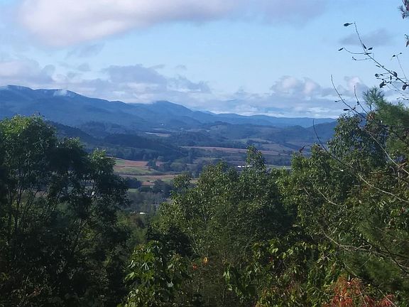 The million-dollar views from the cabin change with the clarity of the air, the leaves dropping during the winter, the smoky mountain look, fog settling into Neva Valley that gives a resemblance of a lake. Of course, the sky puts on quite a show as well.