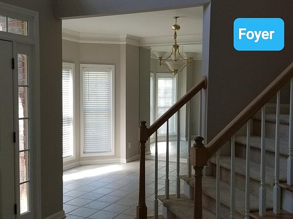 Inside front door with the dining room to your left and the living room/office to the right.