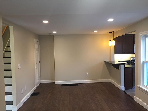 Living room opens up to kitchen