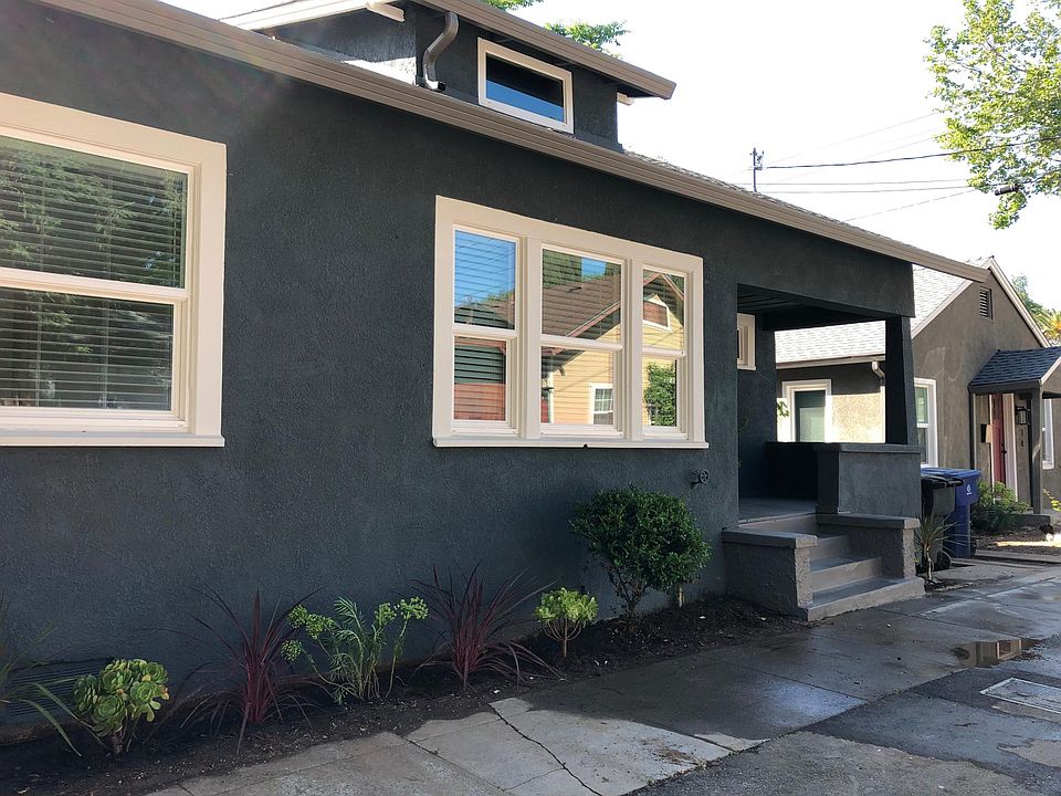 Excellent curb appeal! Large picture window above original built in bench. Inviting stairway and front porch. New drought tolerant landscaping.