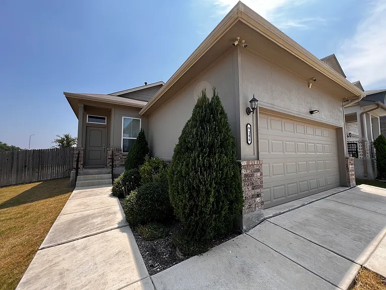 Front entryway, garage, security cameras