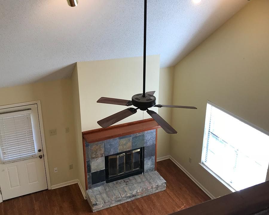 Open floor plan, wood and tile floors throughout.