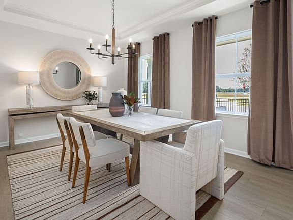 Spacious Dining Area with Ample Room for Everyone - Model Representation