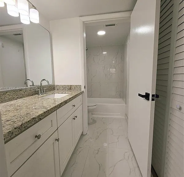 2881 N Oakland Forest Dr #310 — Photo 7