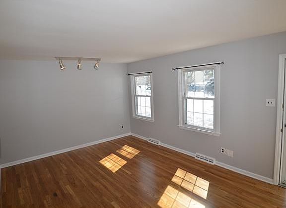 Replacement windows, hardwood floors and sun