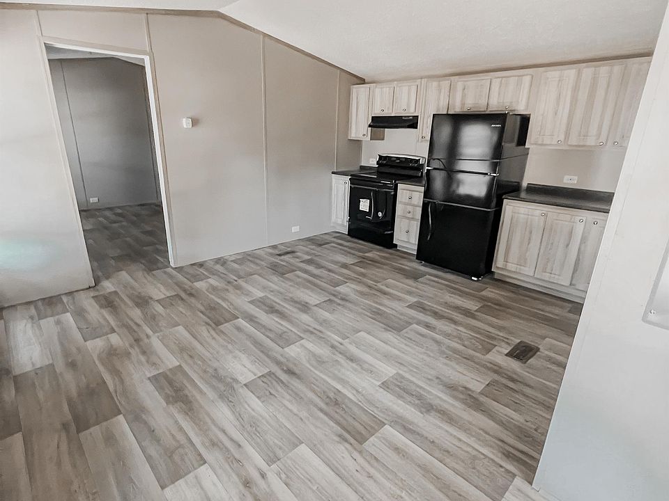 Bright, modern kitchen with new appliances and plenty of space to cook and gather.