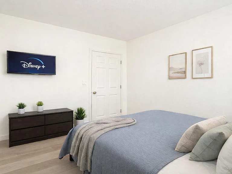 Clean, furnished room with TV and mirror. comfortable, private, and move-in ready.