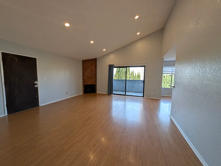 Living area with vaulted ceiling