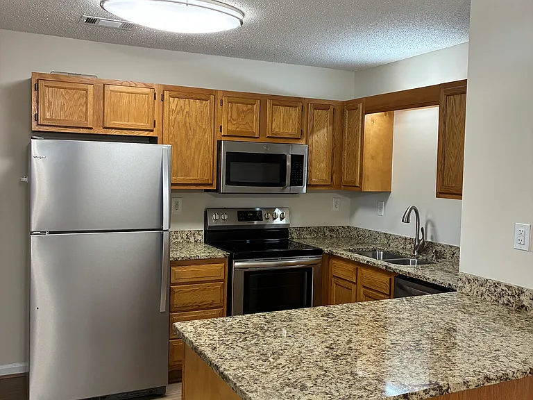 Kitchen, granite countertops and Stainless-Steel appliances