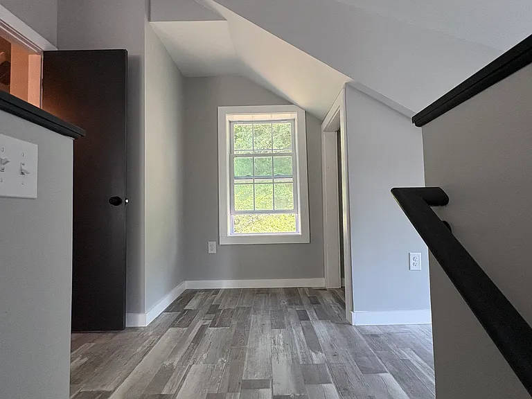 Open, modern loft style space with master bathroom and laundry