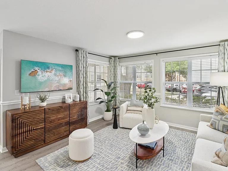 Bright living area with expansive windows and open layout