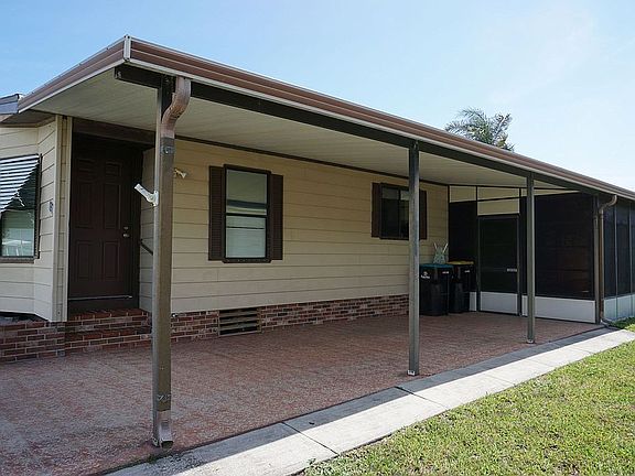 Single carport, front door