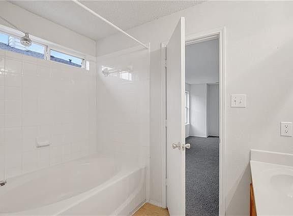 Master bathroom full shower and tub.