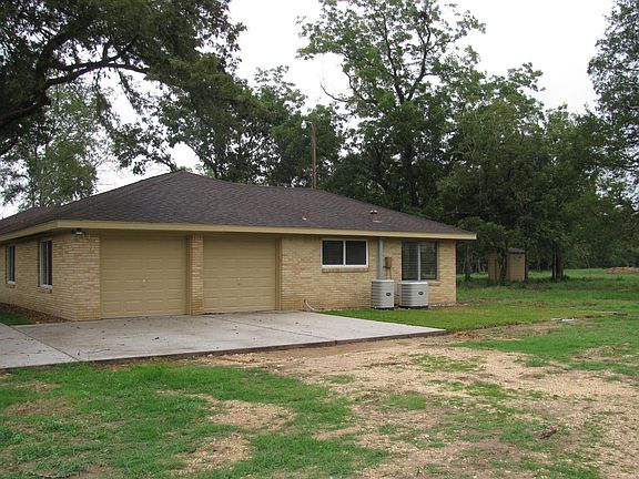 Double Garage and Sunroom windows facing west