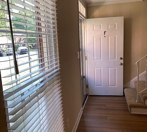 Tall living room window allows for lots of natural light !
