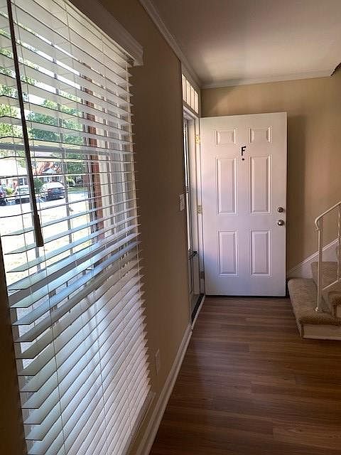 Tall living room window allows for lots of natural light !