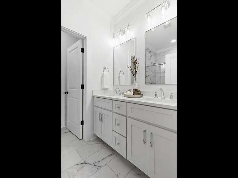 Master bathroom with double vanities.