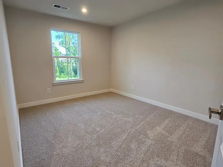 Bedroom 2 which includes Ceiling fan