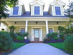 Gorgeous cape cod, professionally landscaped, front porch, back patio