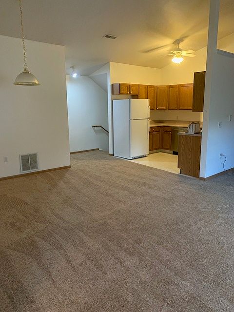 Dining room with new carpet just installed.