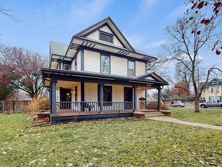 Stately Victorian Home on oversized corner Lot with spacious wrap around porch.