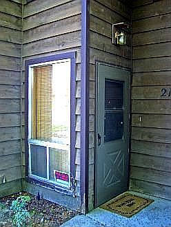 This is the front door, i love the tall windows in the house.
