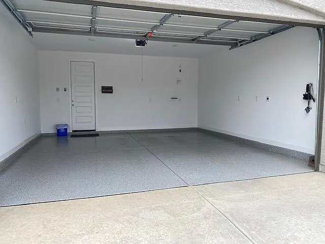 Two car attached garage with epoxy floors--car charger port in garage