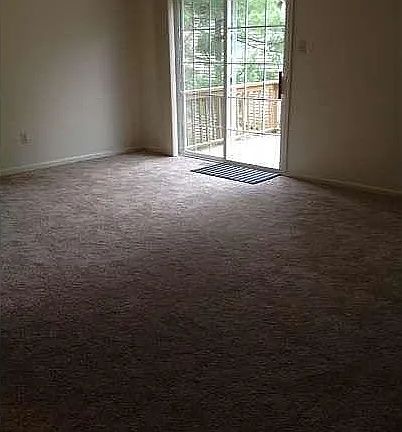 Deck off the living room. This floor has been upgraded to luxury vinyl flooring.