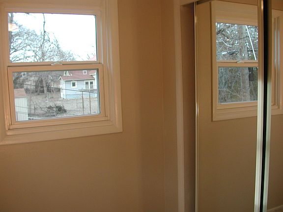 New high effiency windows looking over neighbors back yards, river, and Oak Park