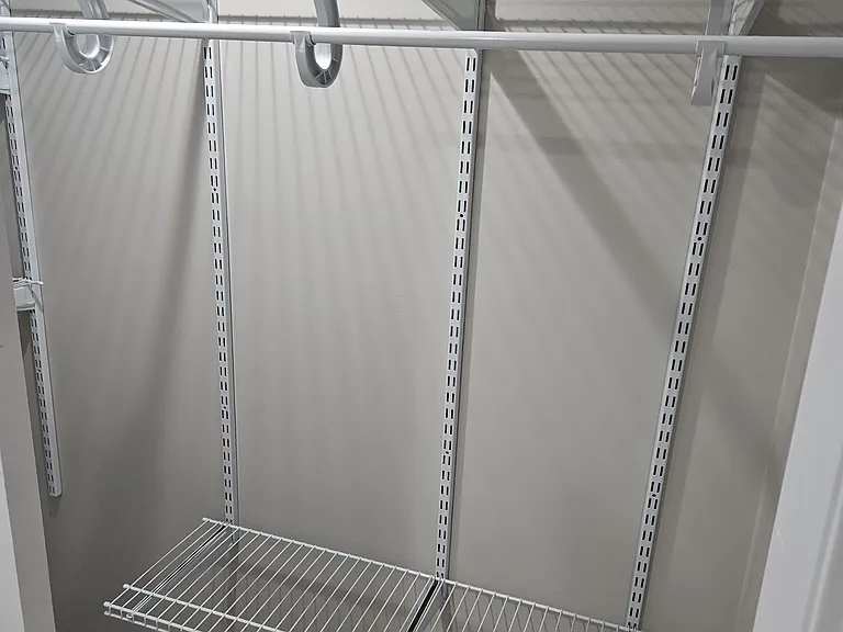 closet organizers in each closet adjustable to your needs